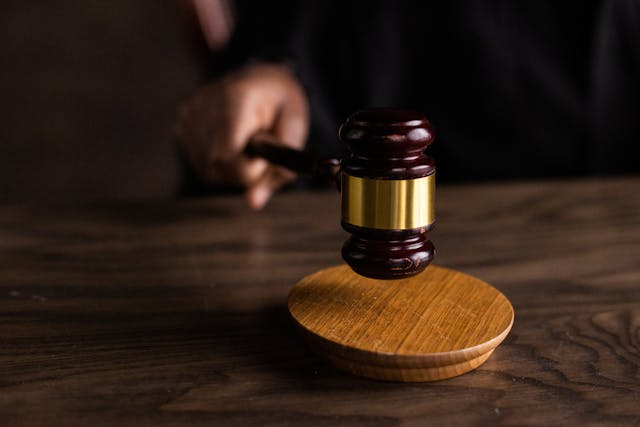 A-judge-banging-their-gavel A-judge-banging-their-gavel