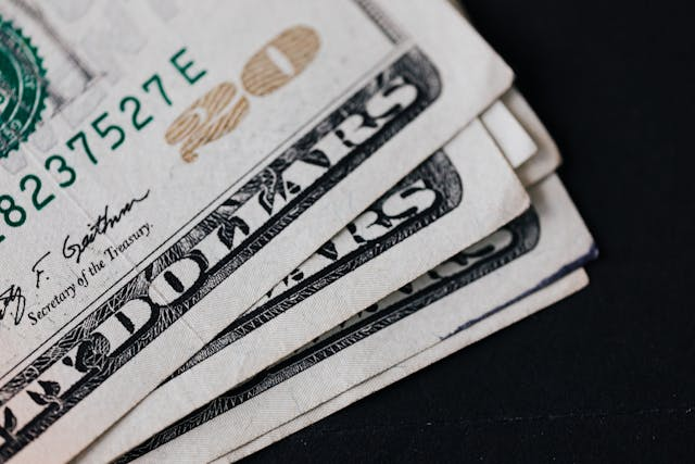 a-bunch-of-American-cash-fanned-out a-bunch-of-American-cash-fanned-out