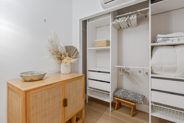 a-large-closet-with-a-built-in-storage-unit a-large-closet-with-a-built-in-storage-unit