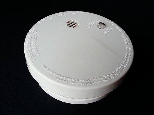 close up of a white smoke detectors in rentals